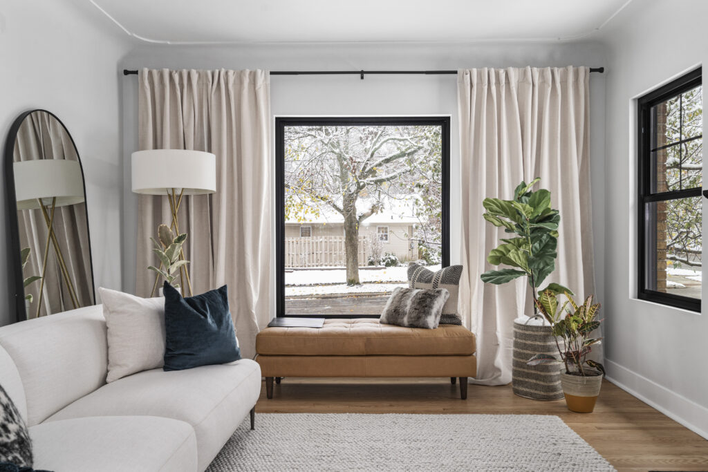 A neutral living room designed by ByDesign Properties