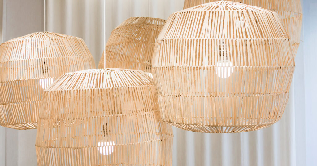 Lighting fixtures using LED bulbs and woven bamboo.